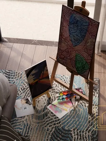 A close-up of the art corner, showing how personal items can be integrated into the room's design. The natural light from the window makes it an ideal spot for creative pursuits.