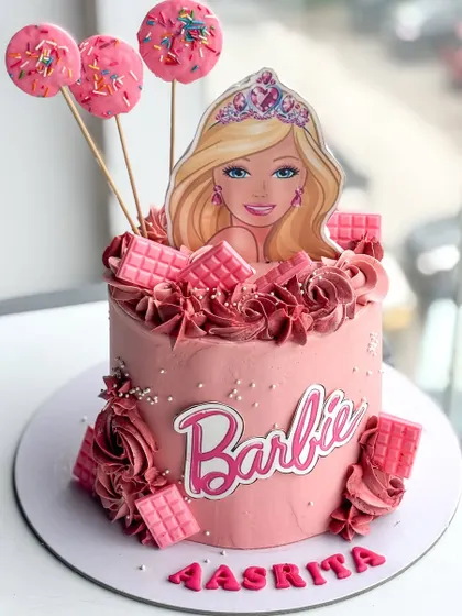 This view shows the placement of the name and the rosette piping at the base.