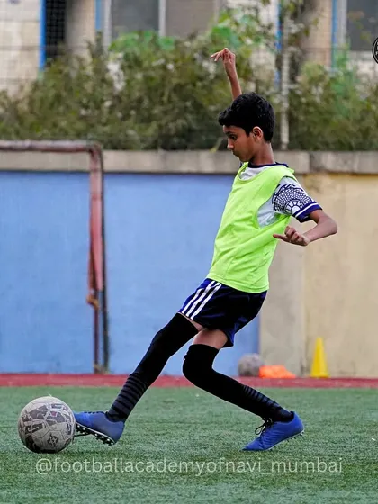 A player practices his shooting form during a training session. I focus on developing a clean and powerful striking technique.