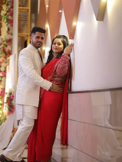 Another lovely couple shot. My client looks absolutely radiant in her red saree, with makeup that enhances her happy glow.