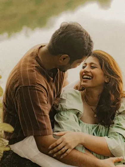 A candid moment of shared laughter. We believe the best pre-wedding photos are the ones that capture your genuine connection and the fun you have together.