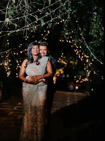 A dreamy cocktail party look under the fairy lights. I created a look with pink glittery eyes that caught the light beautifully, enhancing her natural glow for this romantic evening event. I specialize in creating makeup for brown skin that looks radiant.