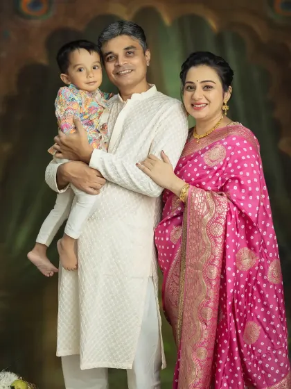 A beautiful family portrait taken during a maternity session. It's so special to include the older sibling as they get ready to welcome the new baby.