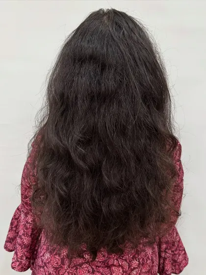 Before the "Brownie + Strawberry Jam" look. This shows how we can take darker hair and infuse it with rich, subtle tones.