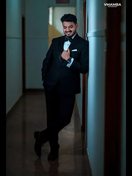 A duplicate of 150, a classic and stylish portrait of the groom.