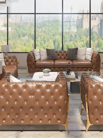 A full view of the executive lounge seating arrangement, set against floor-to-ceiling windows that offer panoramic city views. The space is designed to feel like a high-end private club.