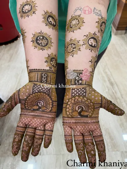 A unique design for a client who wanted to show off her tattoos! I created a pattern of traditional butti motifs with elephants and lotuses around her existing ink.