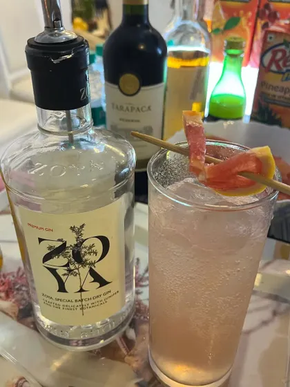 A Zoya Gin cocktail with a grapefruit twist. We love experimenting with different garnishes and flavor combinations.