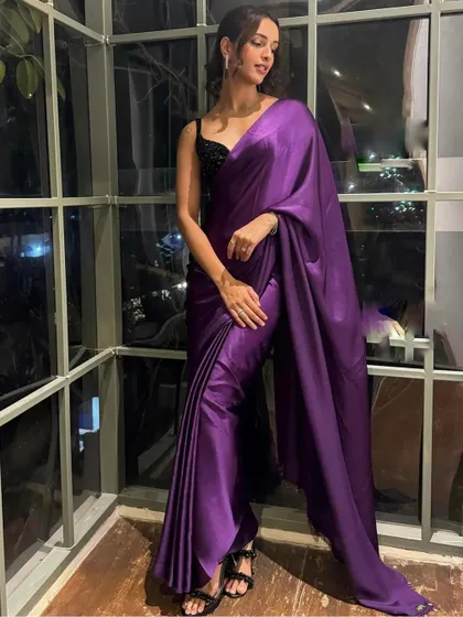 I styled Tripti Dimri in this elegant purple satin saree from Swtantra, paired with a contrasting black sequin blouse. The look is simple, modern, and incredibly chic, proving the power of color and texture.