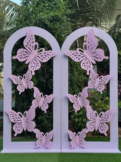 A full view of the dual 3D butterfly panels, which can be used together or separately as a backdrop for a baby shower, birthday, or garden party.