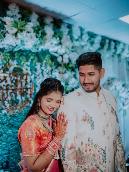 A candid and affectionate portrait of the couple during their engagement ceremony.