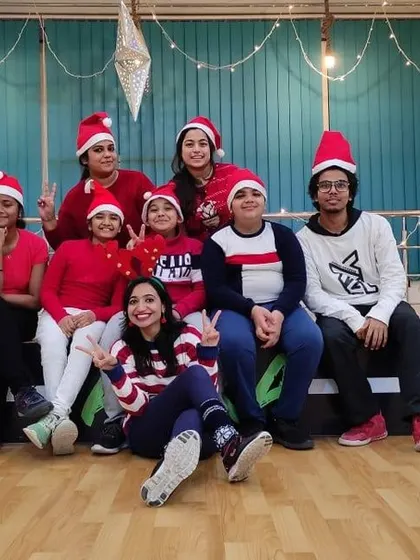 The whole crew posing for a picture during our Christmas celebration.
