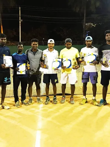 The finalists from a men's tournament held at our academy. We regularly organize competitive matches to keep our senior players sharp and ready for official events.
