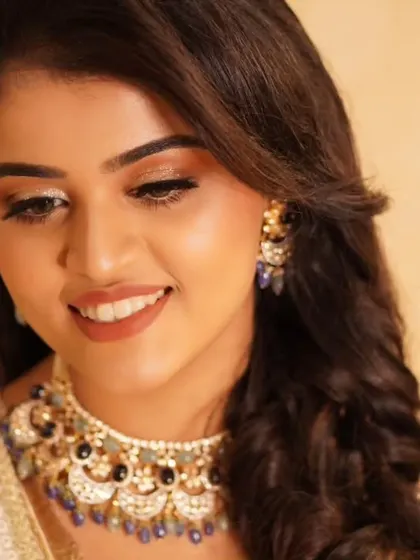 Explore more of my glamorous reception looks, featuring a variety of shimmering eye makeup, flawless finishes, and styles perfect for celebrating in the evening.