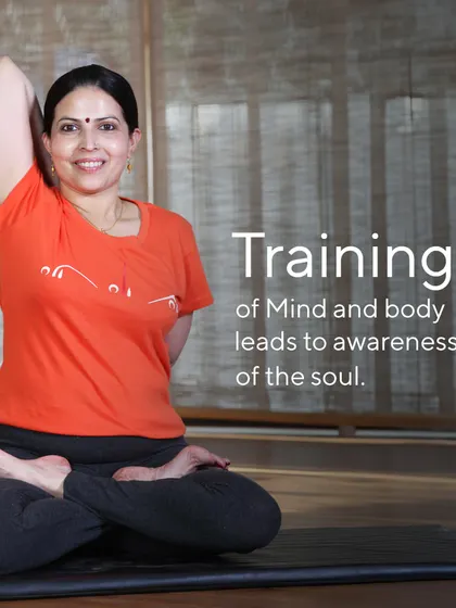 "Training of Mind and body leads to awareness of the soul." This image of me in Gomukhasana embodies this principle of integrating the physical and the spiritual through dedicated practice.