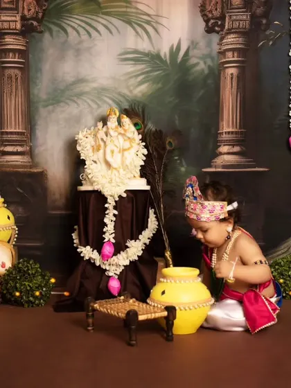 Another angle capturing the innocence of a child dressed as Krishna during our special mini-sessions.