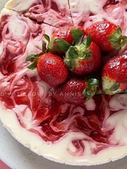Wintertime calls for Baked Strawberry Cheesecake. My creamy egg-free cheesecake is swirled with house-made fresh strawberry compote.