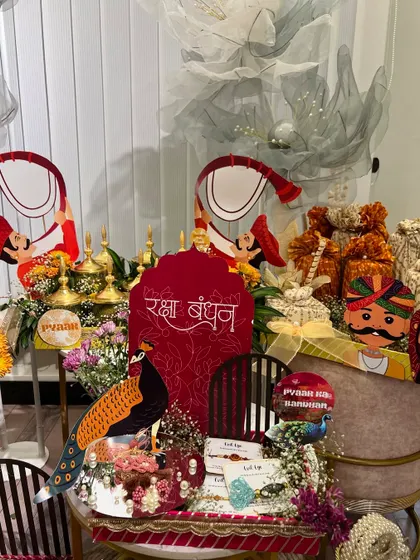 A wider view of the elaborate Rakhi trousseau. We combined traditional elements with modern presentation, using multiple tiers and props to create a visually stunning display.
