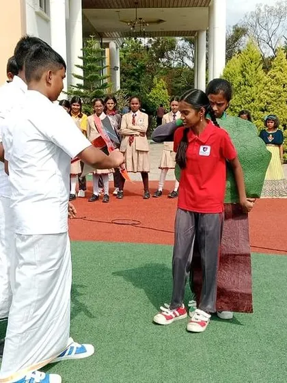 The drama performance continues, illustrating the consequences of deforestation and the need for collective action.
