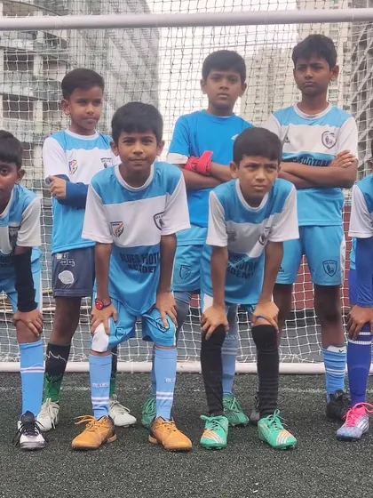 Our Under-8 team stands ready for their tournament match. This photo captures the focus and team unity of our young players before they take the field.