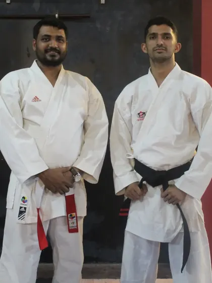Pictured here with a senior instructor during a belt grading test. We believe in learning from the best and fostering relationships with other respected academies to benefit our students.