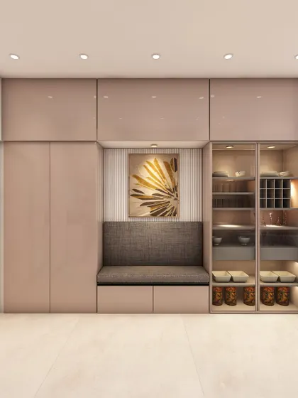 This design features a cozy seating nook built into the kitchen cabinetry, along with a glass-fronted crockery unit, making the space multi-functional.