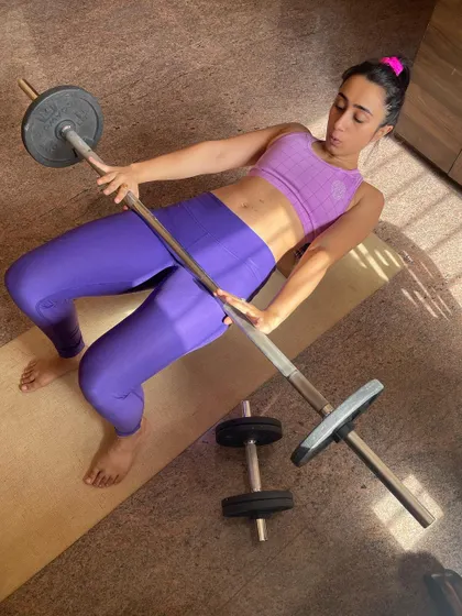 Setting up for another set of hip thrusts at home. I provide guidance on how to create a simple yet effective personal workout space.