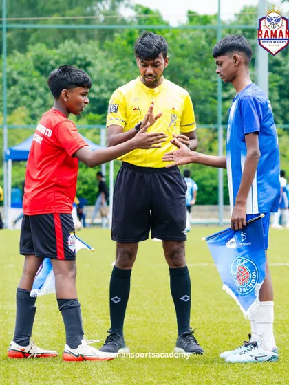 The pre-match handshake between captains, embodying the spirit of sportsmanship.