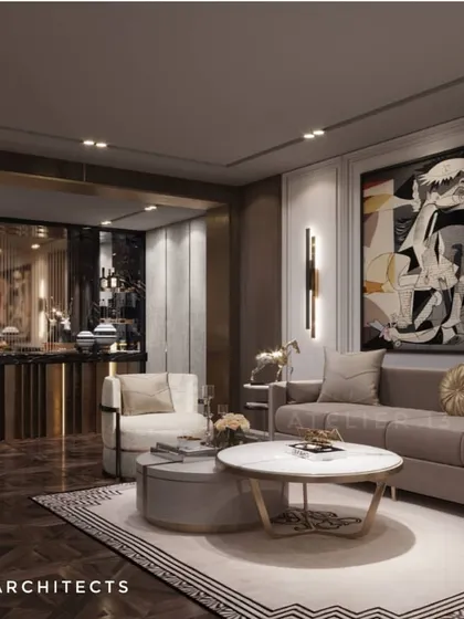 Another view of the art-centric formal area, showing the careful placement of furniture to create conversation zones. The dark marble floor and neutral sofas allow the statement artwork to remain the undisputed hero of the space.