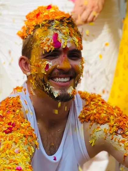 The groom enjoying the playful spirit of the phoolon ki holi. I make sure that pre-wedding events are just as much about the groom and his family as they are about the bride.