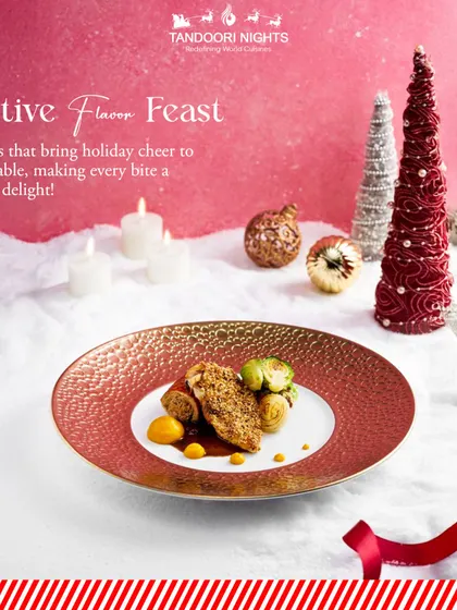 A festive flavor feast on a plate. This dish, served on a textured copper plate against a snowy backdrop, embodies the warmth and cheer of our holiday catering menus.