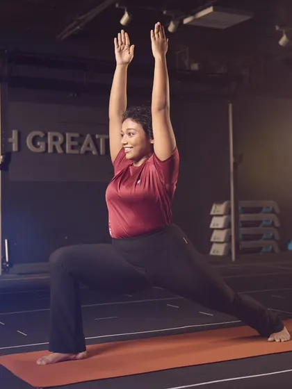 Virabhadrasana I, or Warrior I, is a powerful standing pose that builds strength and confidence. Here, I focus on grounding through the feet while lifting through the chest and arms.