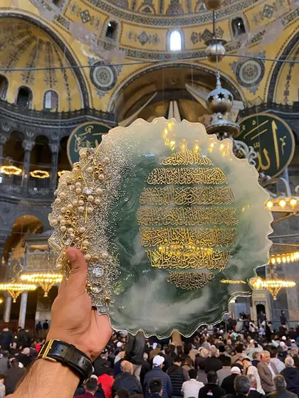 It was a blessing to bring my art to the grand Hagia Sophia. This photo captures my Ayat ul Kursi plaque, handcrafted with green and white resin, within the walls of this historic and spiritual place.