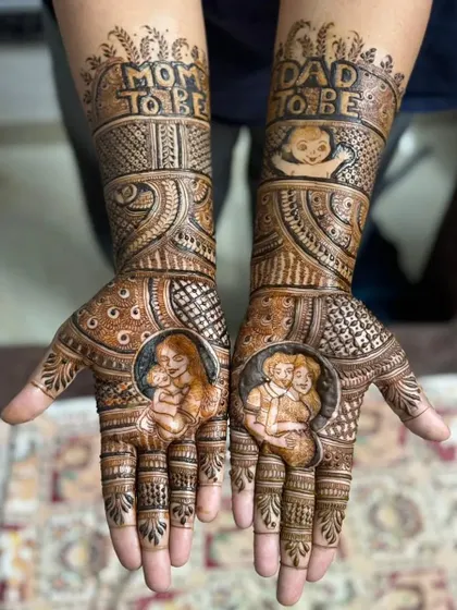 Celebrating the journey to parenthood with this detailed baby shower mehendi. The palms feature sweet portraits of the mother and father holding their baby, surrounded by traditional patterns.
