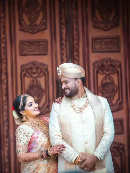 A lovely candid portrait of the couple sharing a happy glance. We look for these unscripted interactions that reveal the genuine connection between two people.