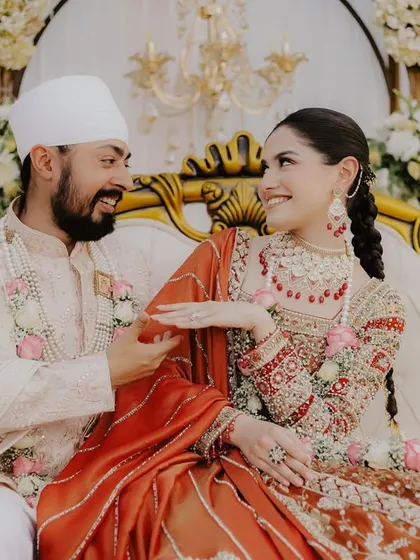 A playful, candid moment between a Sikh couple at ITC Dwarka. It’s these lighthearted interactions, the shared glances and smiles, that I believe are the soul of a wedding album.