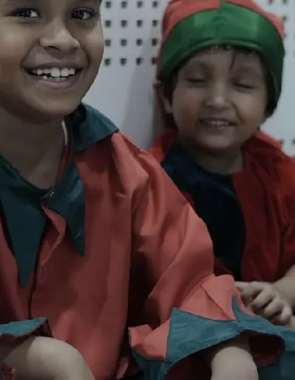 Pure happiness on the faces of our young elves backstage. The joy of creating and performing together is what it's all about.