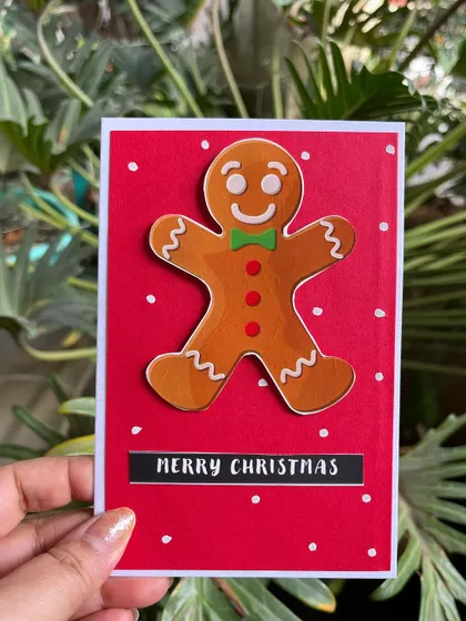 A close-up of our adorable gingerbread man card, a simple and sweet way to spread Christmas joy.