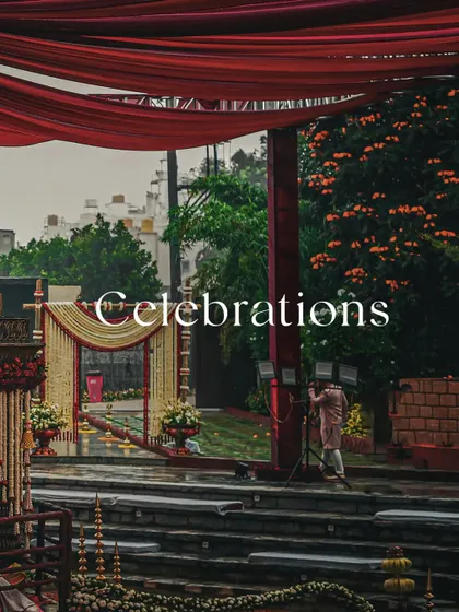 An atmospheric shot of a traditional wedding setup in the rain, with the word "Celebrations" overlaid. It captures the mood and resilience of our team.