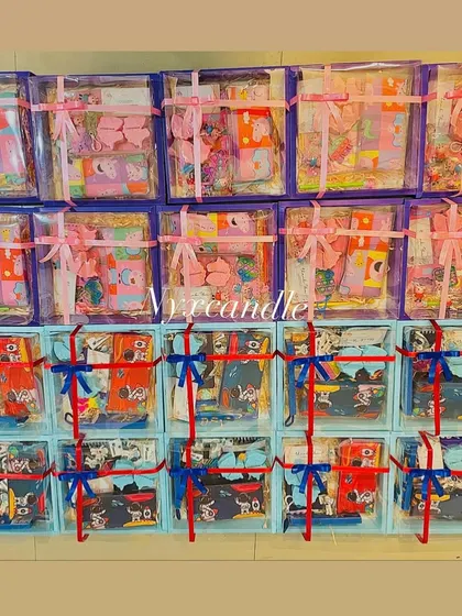 A full view of a large order combining two themes. The top rows feature Unicorn hampers, while the bottom rows have Space-themed gifts.