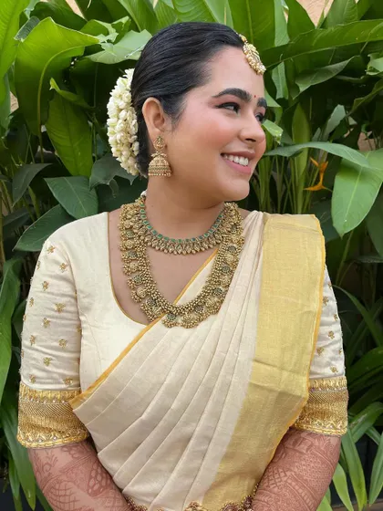 A happy and confident bride. The soft pink rosy lip adds a touch of color to the minimal makeup look.