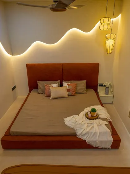 An elevated view of the platform bed, highlighting the clean lines and the calming, uncluttered feel of the space.
