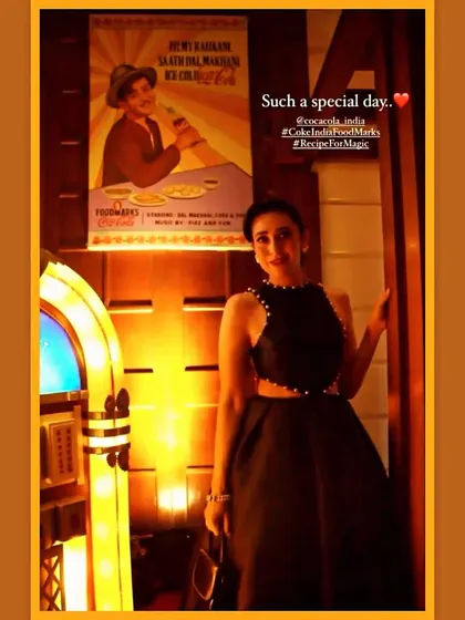 Actress Karishma Kapoor posing in front of my Raj Kapoor painting at the Coca-Cola event. It's an honor to see my work become part of such special celebrations.