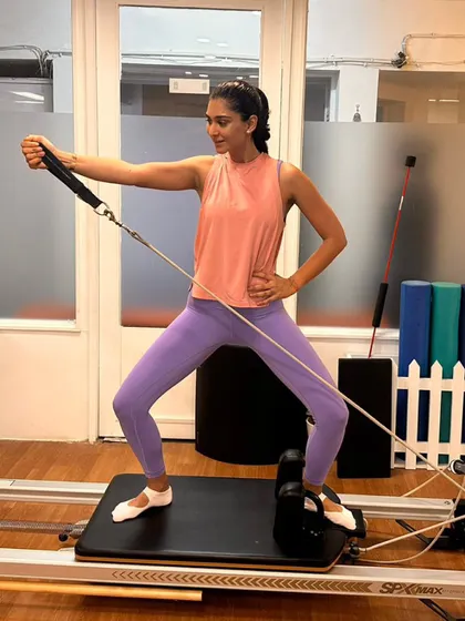 Various shots of members and instructors in action during our dynamic Reformer Pilates classes.