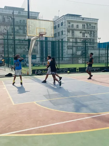 A wide view of a Juniors practice, showing multiple kids engaged in the game.