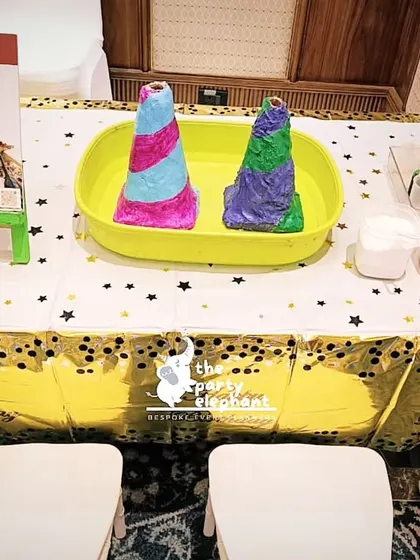The "Fizzy Volcano" science activity table. We love incorporating fun, educational activities that fit the party's magical and wondrous theme.