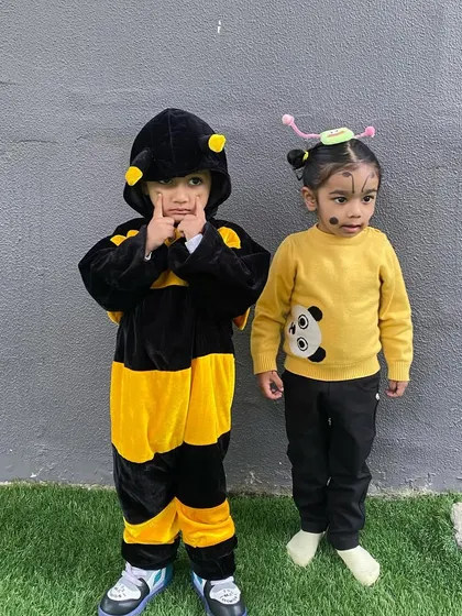 A buzzing bee and a little bug. Our theme days are a fun way for children to learn about different topics, and the costumes make it an even more memorable experience.
