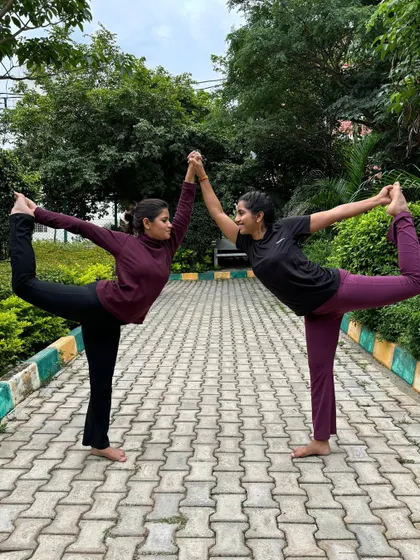 Making new friends on the yoga journey. This is a partner version of Natarajasana (Dancer's Pose), a beautiful expression of balance and support.