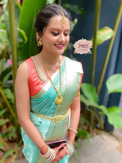 Another shot of this natural and elegant makeover. The light blue saree is beautifully complemented by the soft, glowing makeup.