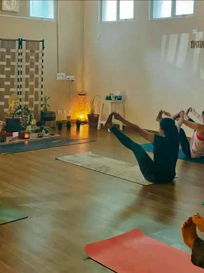 A full class working on Navasana (boat pose), a challenging posture for building core and hip flexor strength.